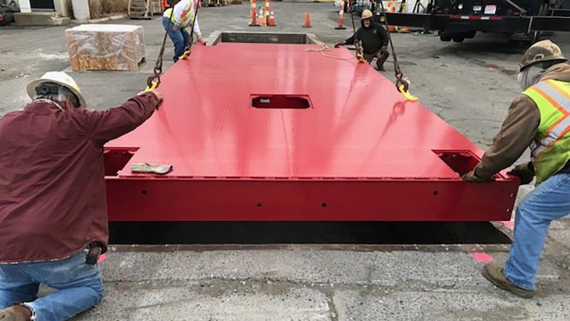 Able Scale workers installing a truck scale